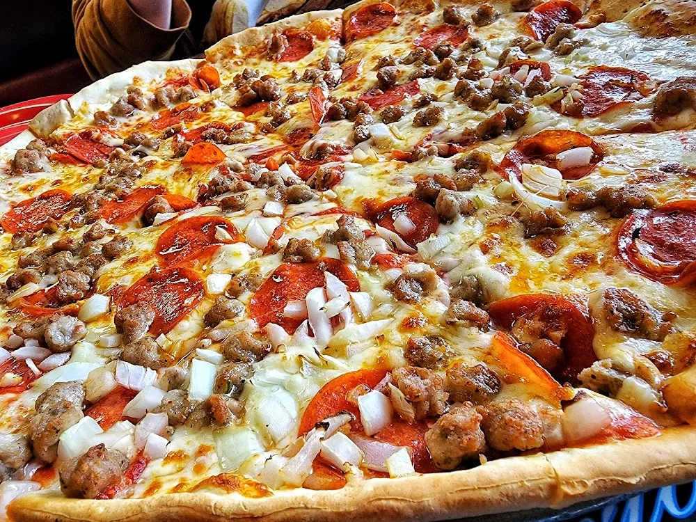Pepperoni Sausage an Onion Pizza